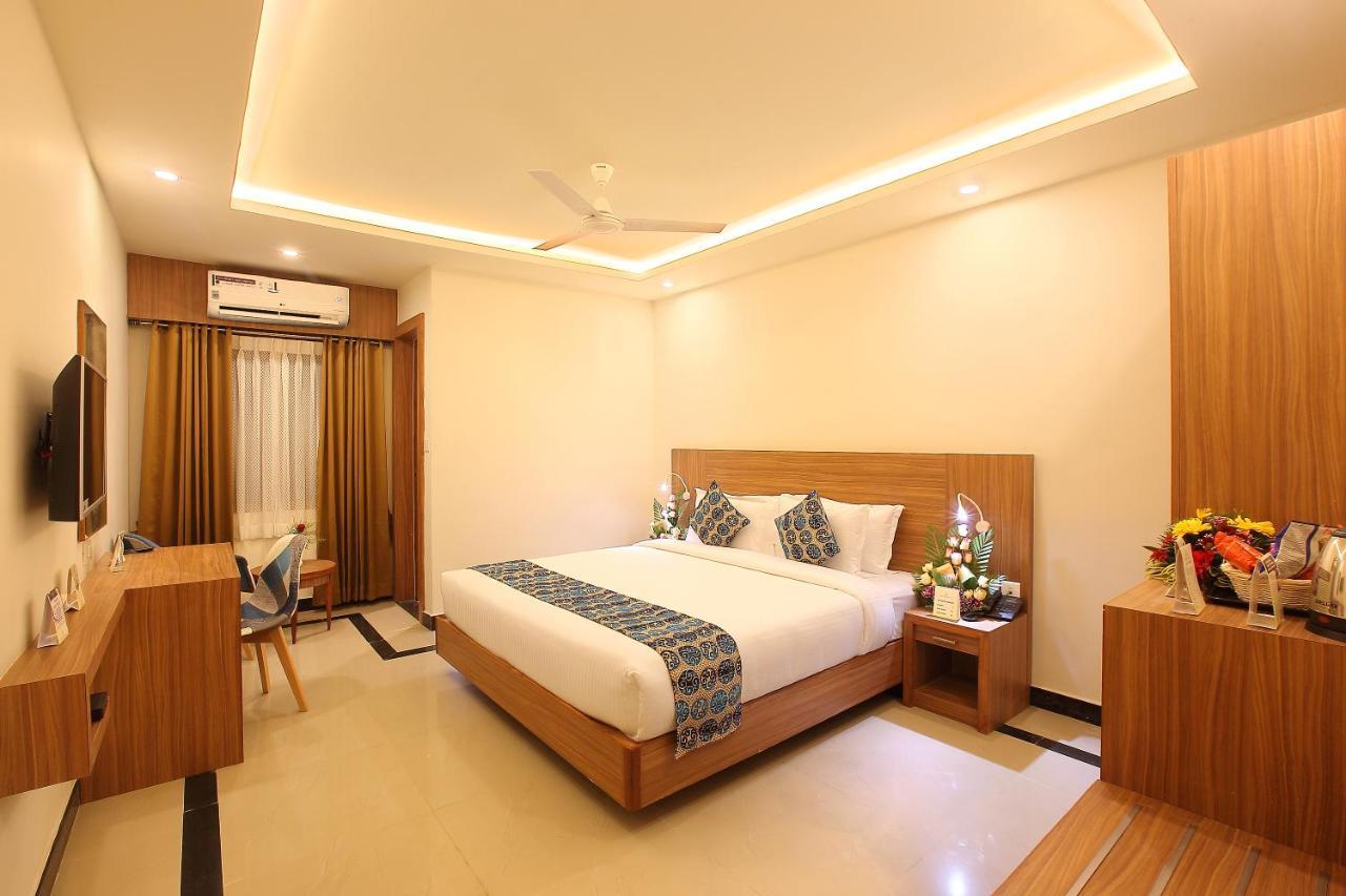 Hotel Heyday Pathanamthitta ภายนอก รูปภาพ